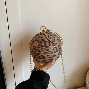 Spherical leopard print evening clutch with gold rhinestone handle and chain strap