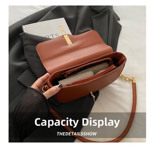 Internal view showing capacity of the brown lychee leather saddle bag with zip pocket