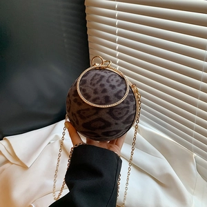 Leopard print spherical handbag with rhinestone circular handle and gold chain strap