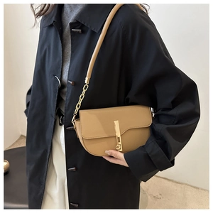 Elegant khaki lychee grain leather shoulder bag with a sleek gold metal lock closure