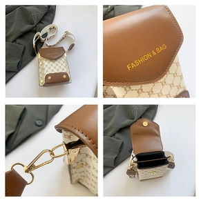 Detail view of contrast stitching mini square bag showing logo and inner space