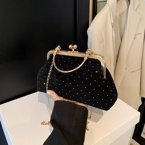 Sac de soirée élégant en velours noir avec perles et poignée en métal doré chic