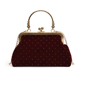 Elegant deep red velvet shell bag with sparkling rhinestones and gold floral metal handle