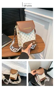 Detail view of contrast stitching and metal rivet on small crossbody flap bag in beige