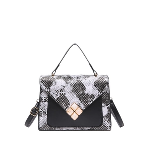 Chic black and white snakeskin patchwork crossbody bag with a square silhouette
