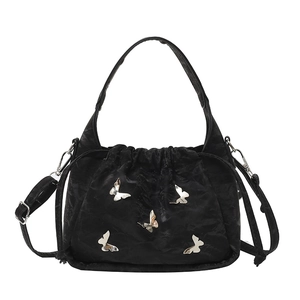 Black nylon bucket bag with metallic butterflies and adjustable strap for women