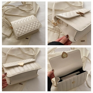 Detailed views of white quilted crossbody bag with golden heart clasp and interior space