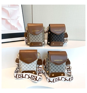 Detail of small flap crossbody bags with monogram patterns and wide geometric straps