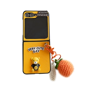 Yellow leather folding case for Samsung Z Flip series with 3D bear and knitted orange charm