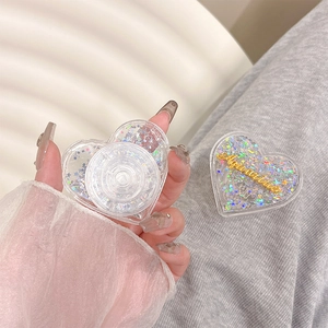 Heart-shaped liquid glitter phone socket with Aquarius gold lettering and sequins