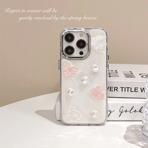Pearlescent white shell texture iPhone case featuring 3D rabbit and pearl charms