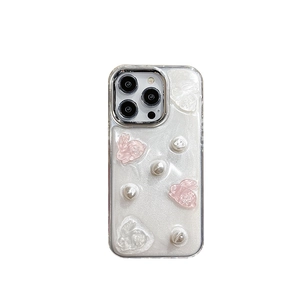Glitter iPhone case with 3D resin bunnies and pearl accents for 16 Pro Max
