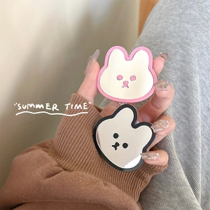 Cute bunny shaped portable vanity mirror and phone grip accessory in pink and black