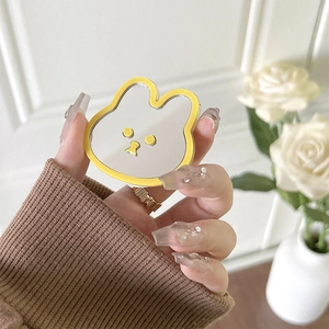 Handheld cute yellow bunny phone socket with integrated compact mirror for makeup