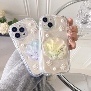 Ins-style iPhone case with 3D shell, glitters, and pearls on pearlescent liquid sand