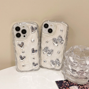 Silver bow and heart motifs on marble texture iPhone case with wavy protective edges
