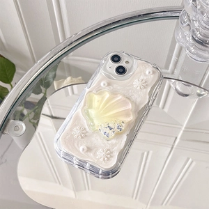 Detail of 3D cream glue iPhone case with iridescent shell stand and pearl snowflake decor