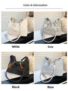 Detail of ruched shoulder bags in white, gray, black, and blue with large bead accents