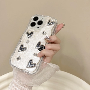 Detail of iPhone case with silver hearts, rhinestones and 3D cream texture finish