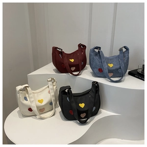 Chic heart patch underarm bags in burgundy, denim blue, cream and black colors