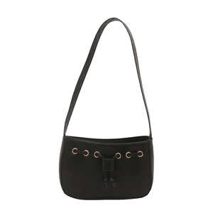 Minimalist black faux leather shoulder bag with drawstring knot and gold eyelets