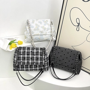 Fashionable chain crossbody bags in plaid and floral patterns with bow decoration