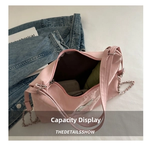 Pink glossy tote bag with spacious interior showing daily essentials and leather strap