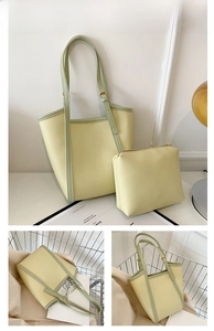 Detailansicht des großen grün-gelben Shopper-Sets mit verstellbaren Riemen in schlichtem Design