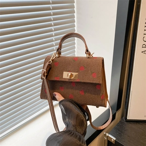 Vintage brown corduroy crossbody bag with strawberry pattern and gold turn-lock clasp