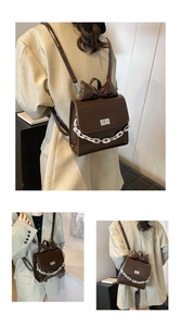 Detail of dark brown patent leather backpack featuring a large bow and silver chain link
