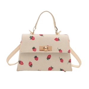 Leopard print crossbody bag with strawberry corduroy design and gold turn-lock closure