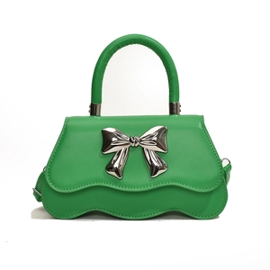Vibrant lime green handbag with large silver bow and stylish wavy edge design