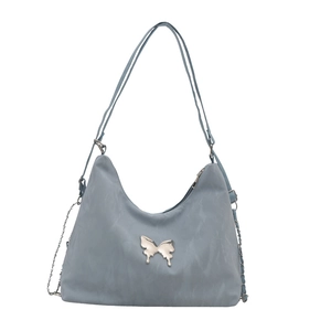 Light blue faux leather hobo bag featuring a silver metal butterfly buckle and strap