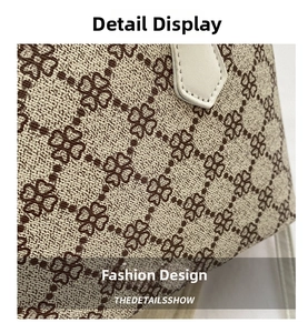 Macro shot of quilted pattern on beige synthetic leather with clover prints and fine stitching