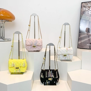Chic quilted crossbody bags with chain straps in yellow, pink, white, and black colors