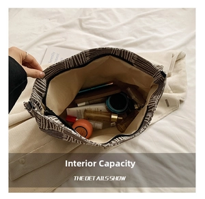 Spacious interior of striped tote bag showing large capacity for daily essentials