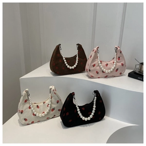 Corduroy crescent shoulder bags with strawberry print and pearl handles in four colors