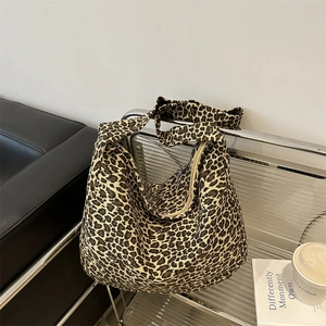 Large leopard print canvas hobo bag for women with casual crossbody shoulder strap