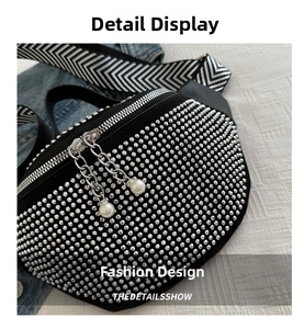 Detail of sequin rhinestone waist bag with pearl zipper pull and chevron woven strap