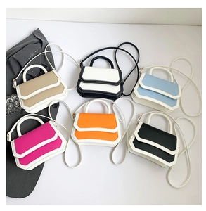 Selection of six stylish crossbody bags in various colors with contrast trim edges