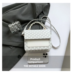 White PU leather bag with M-monogram texture and oversized pearl handle detail
