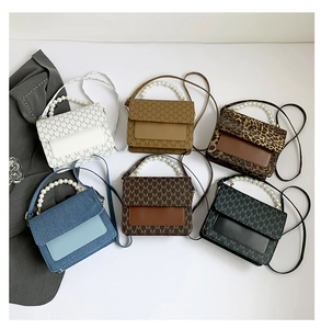 Various PU handbags with pearl handles in leopard, denim, and monogram prints