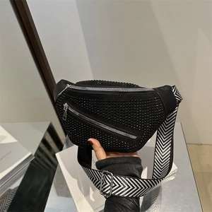 Chic black beaded crossbody bag with wide patterned strap and silver zippers