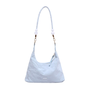 Light blue pleated tote bag with large decorative white beads on the shoulder strap