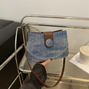 Chic blue glitter tote bag with brown leather flap and silver chain for women