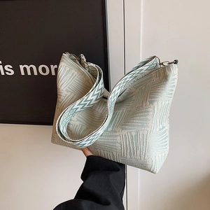 Striped knit canvas shoulder bag with wide geometric pattern strap for women