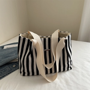 Large capacity striped canvas tote bag with cream straps for commuting and students
