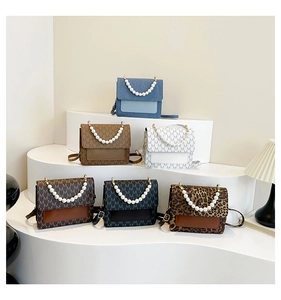 Detailed display of fashionable crossbody bags with pearl handles in six trendy colors