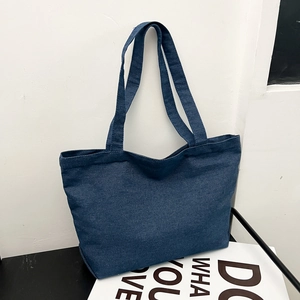 Minimalist large capacity dark blue denim tote bag with washed texture and dual handles