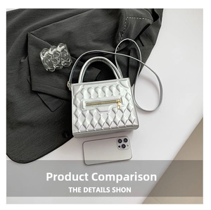 Silver rhombic patterned small square bag with golden zipper and metallic luster detail